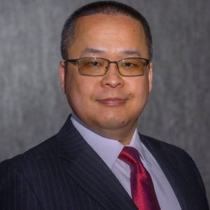 Portrait of Harry Budisidharta, Executive Director, Asian Pacific Development Center of AUHMC